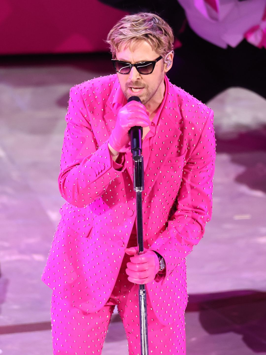 Ryan Gosling performing in hot pink from head-to-toe