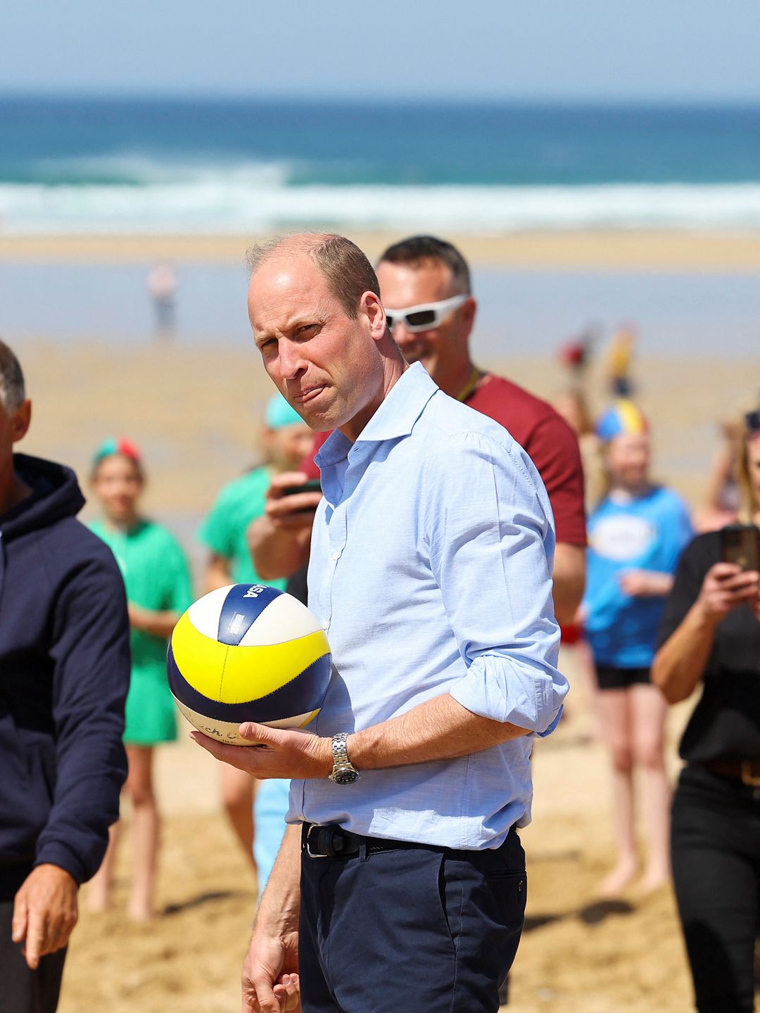 prince william holding volleyball 