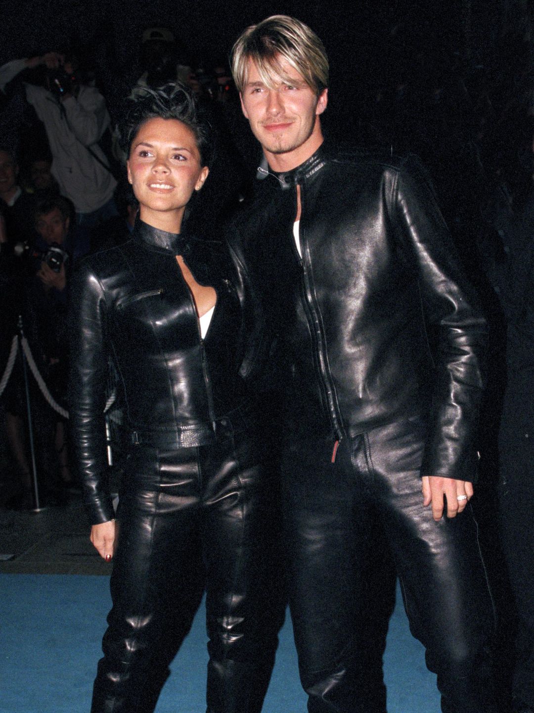 David & Victoria Beckham Attend The 'Versace Club' Gala Party In London wearing matching leather looks