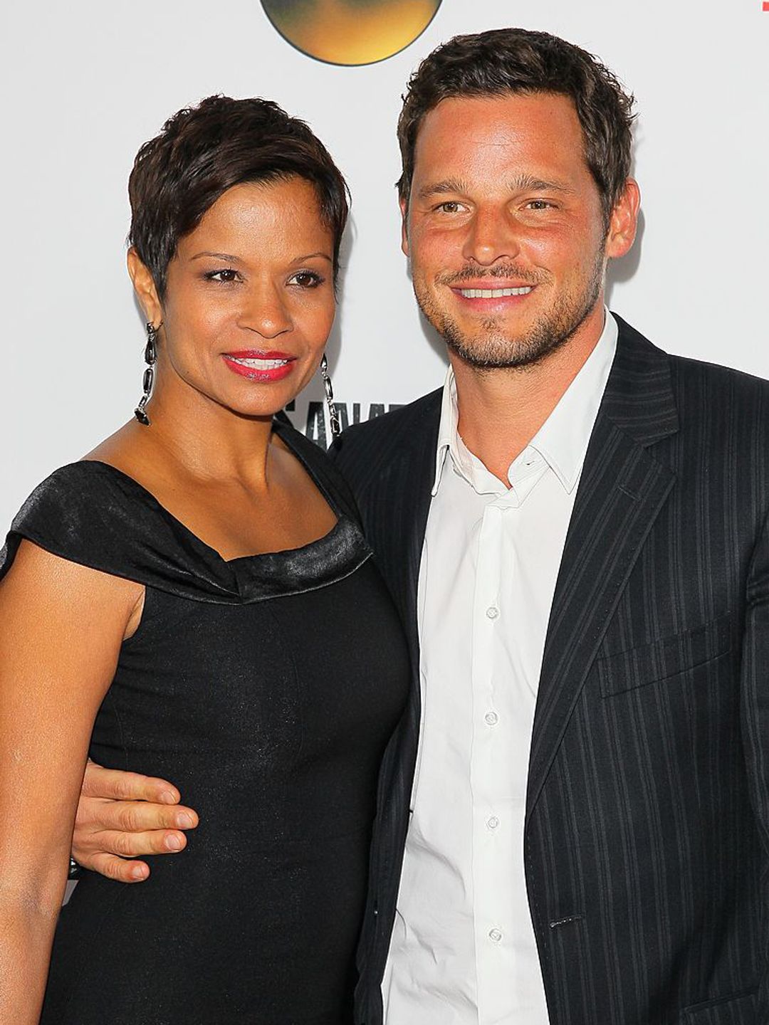 Justin and Keisha Chambers cuddle up for a photo on the red carpet