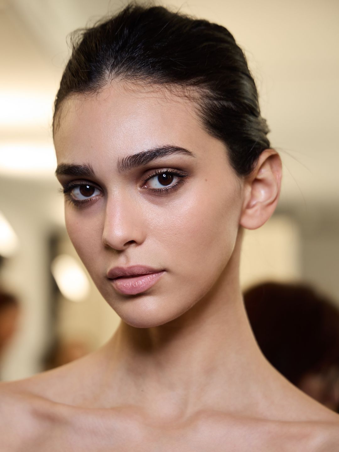 Model at Elie Saab wears brown smoky eye