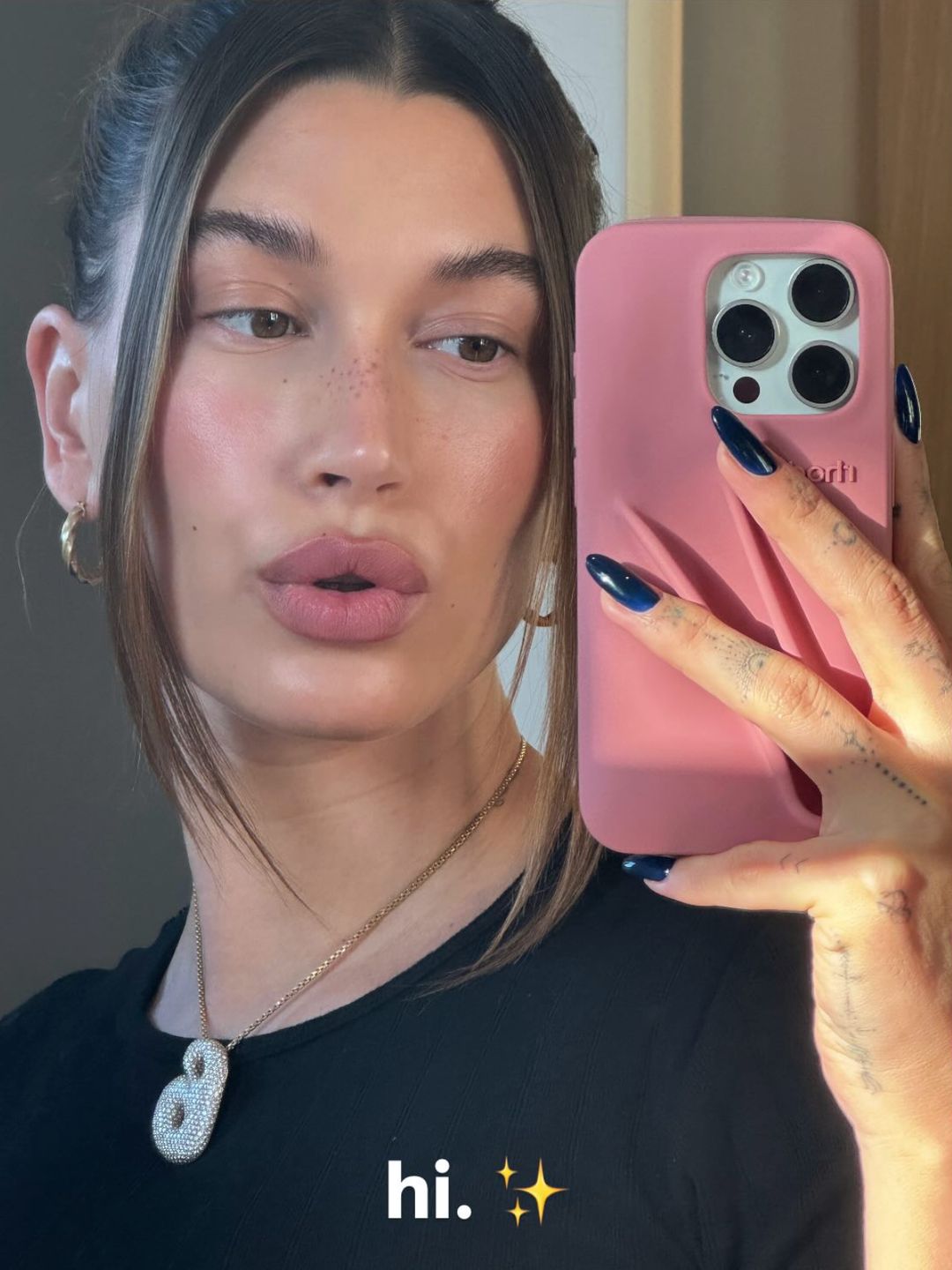 Hailey Bieber shares selfie to Instagram with pink lipstick 