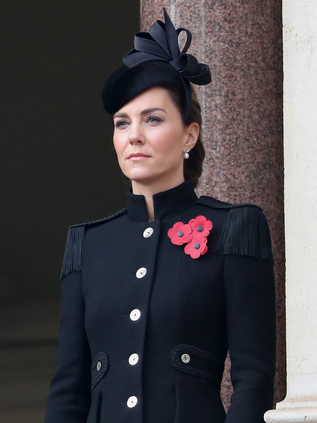 Princess Kate wears black Catherine Walker military style coat, adorned with three poppies, during the National Service of Remembrance at The Cenotaph on November 8, 2020