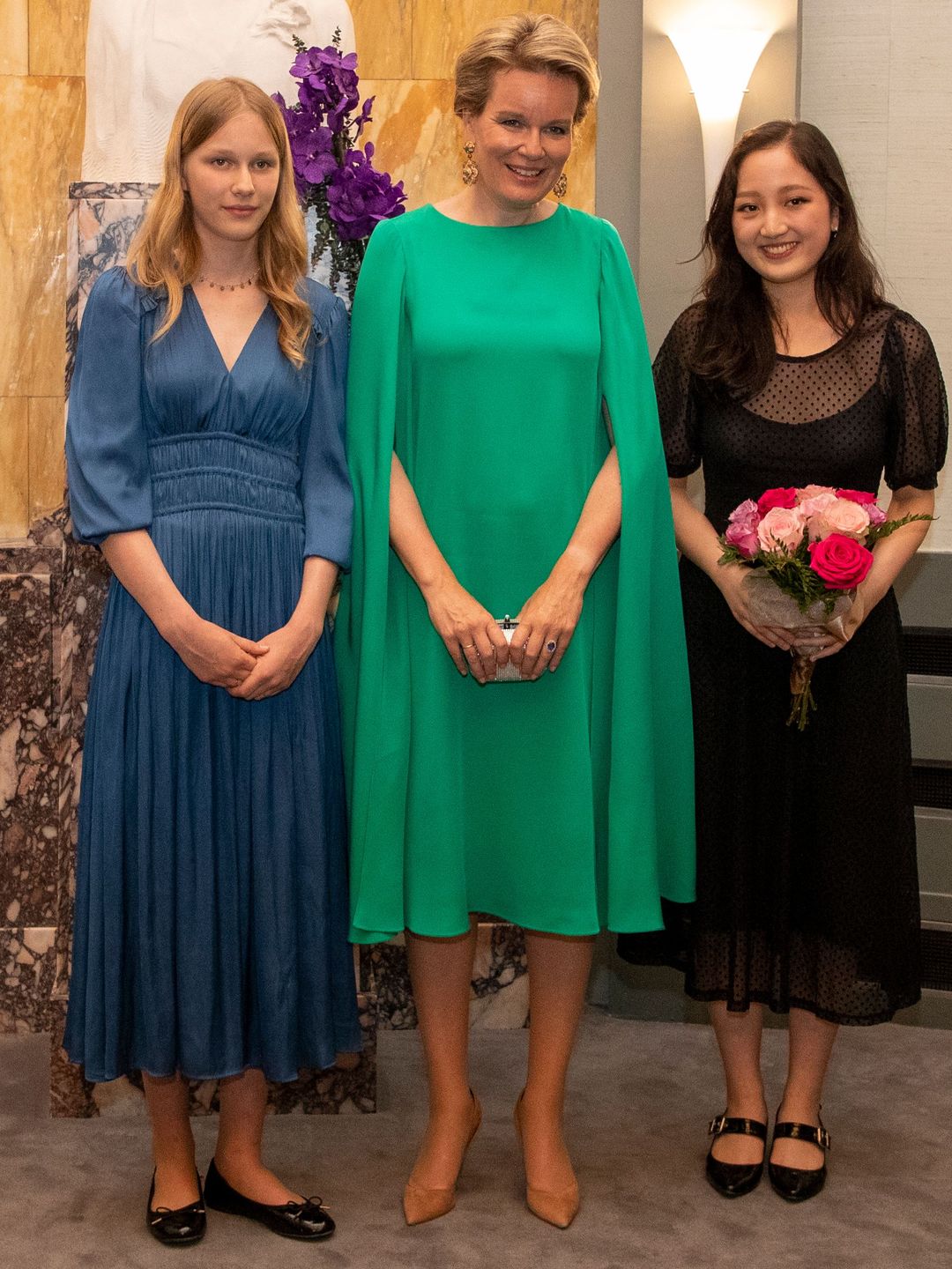 Princess Eleonore in a blue dress with Queen Mathilde of Belgium 