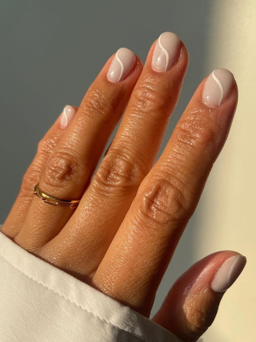 Neutral nails with line across them