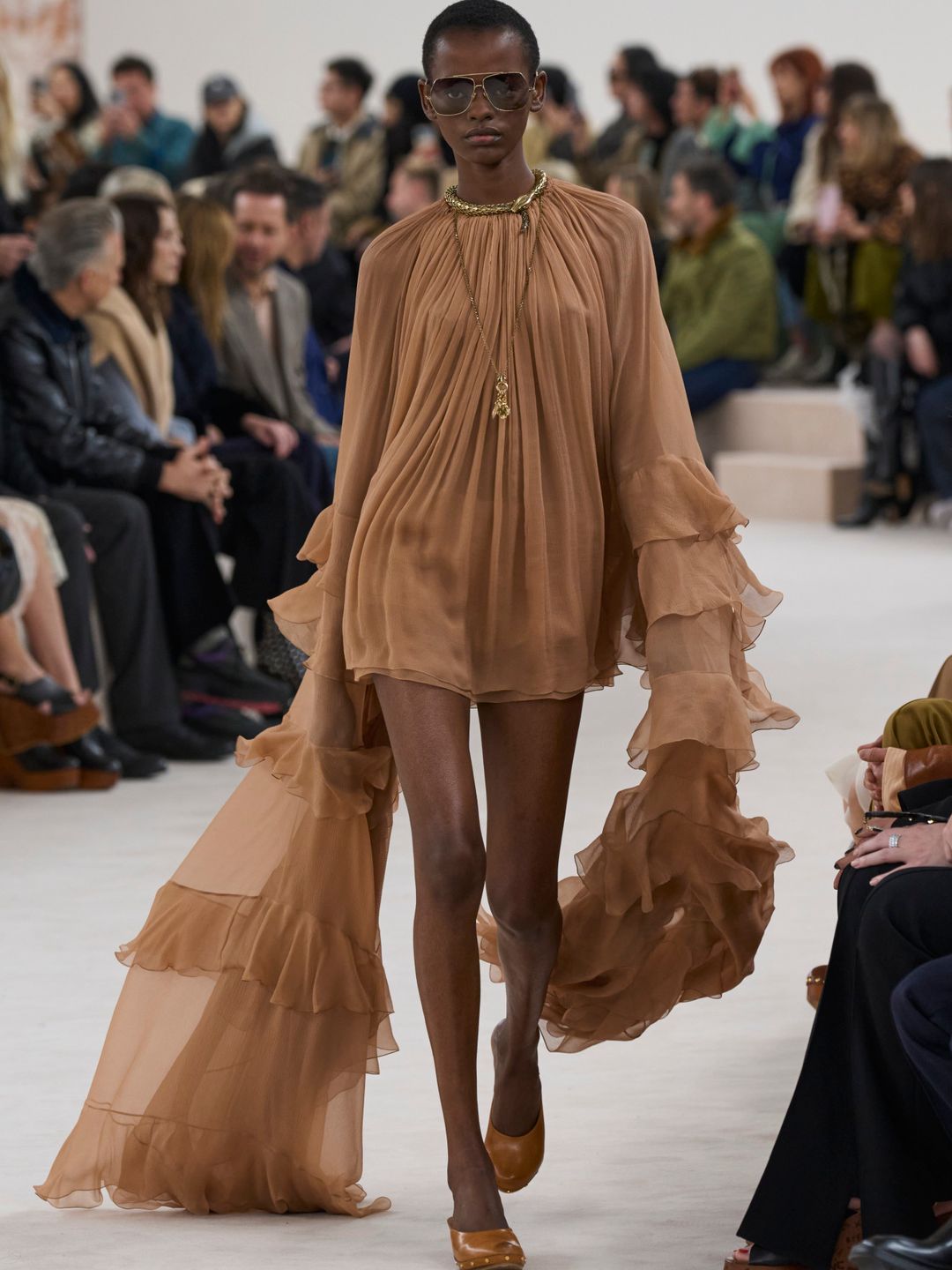 Earthy tones and chiffon ruffled dresses were seen at Chloé