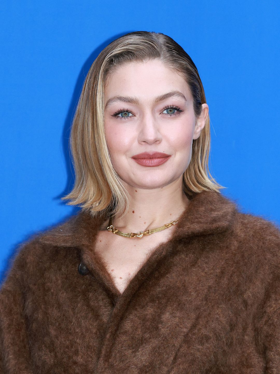 Gigi Hadid poses for media during the "Guest In Residence" Seoul pop-up store opening at Tom Greyhound on November 04, 2024 in Seoul, South Korea.