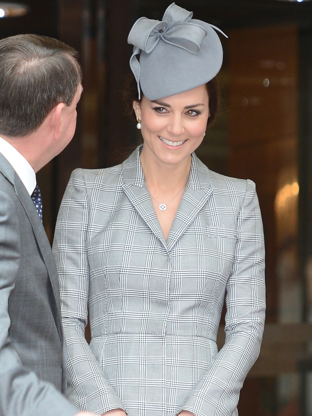 atherine, Duchess Of Cambridge wears a grey suit dress and hat For The State Visit Of The President Of The Republic Of Singapore in 2014