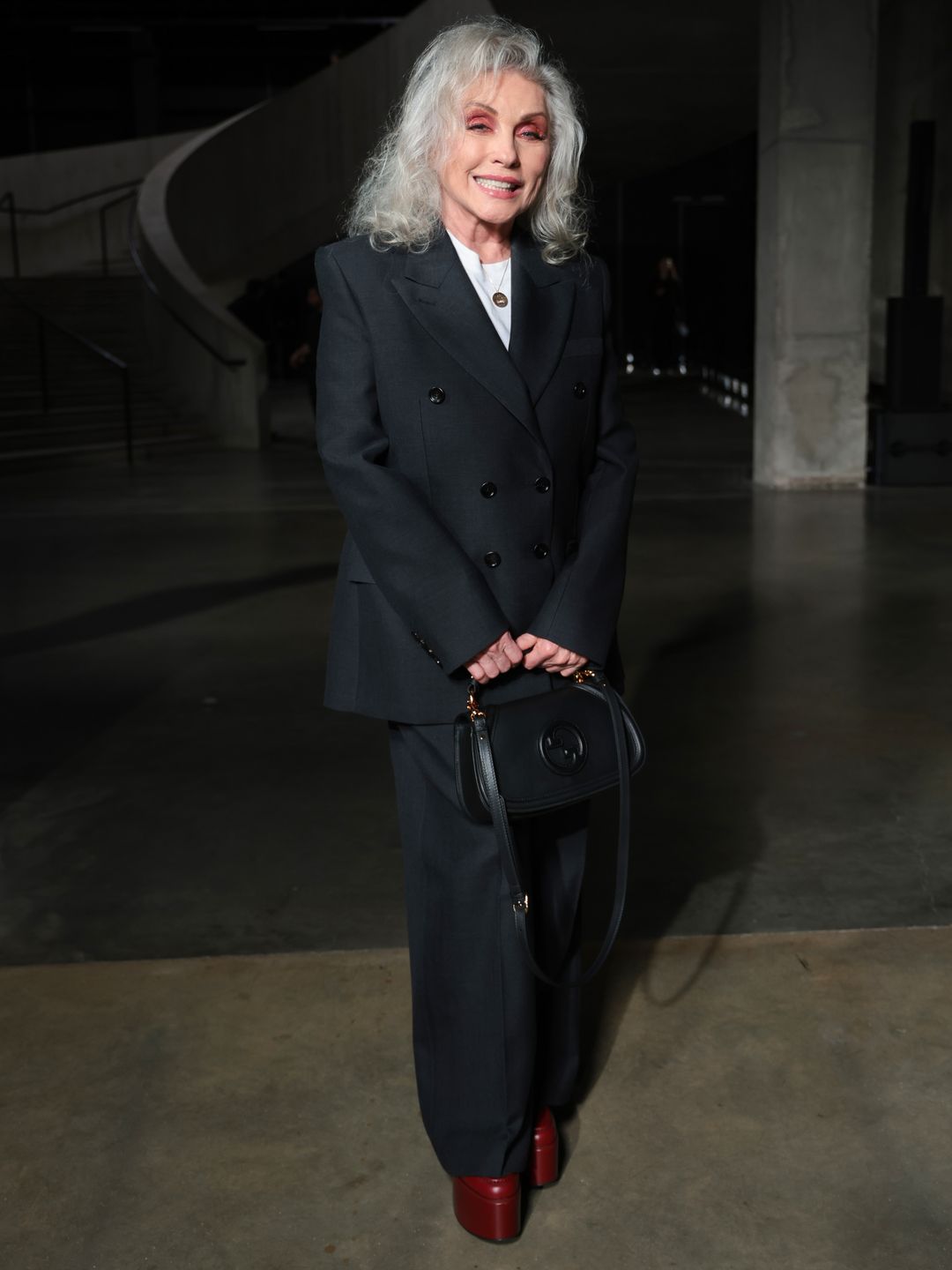 Debbie Harry wearing a black suit 