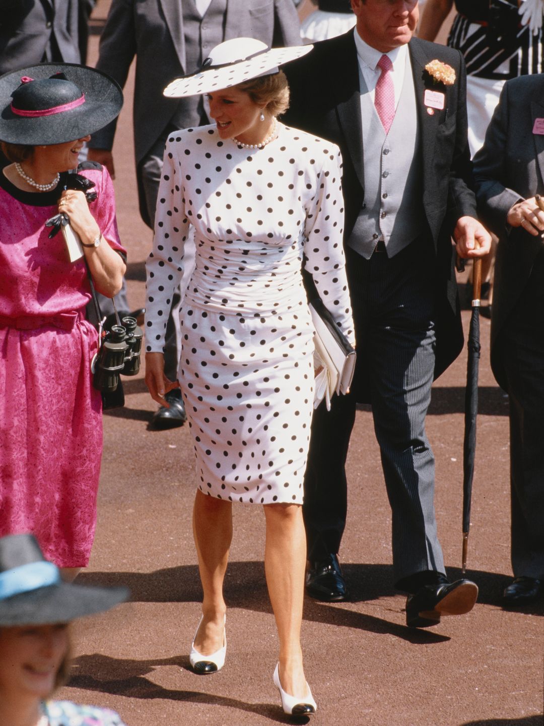 Diana, Princess of Wales attended Ascot race meeting in England, wearing a black and white spotted dress by Victor Edelstein and a Philip Somerville hat, June 1988.  