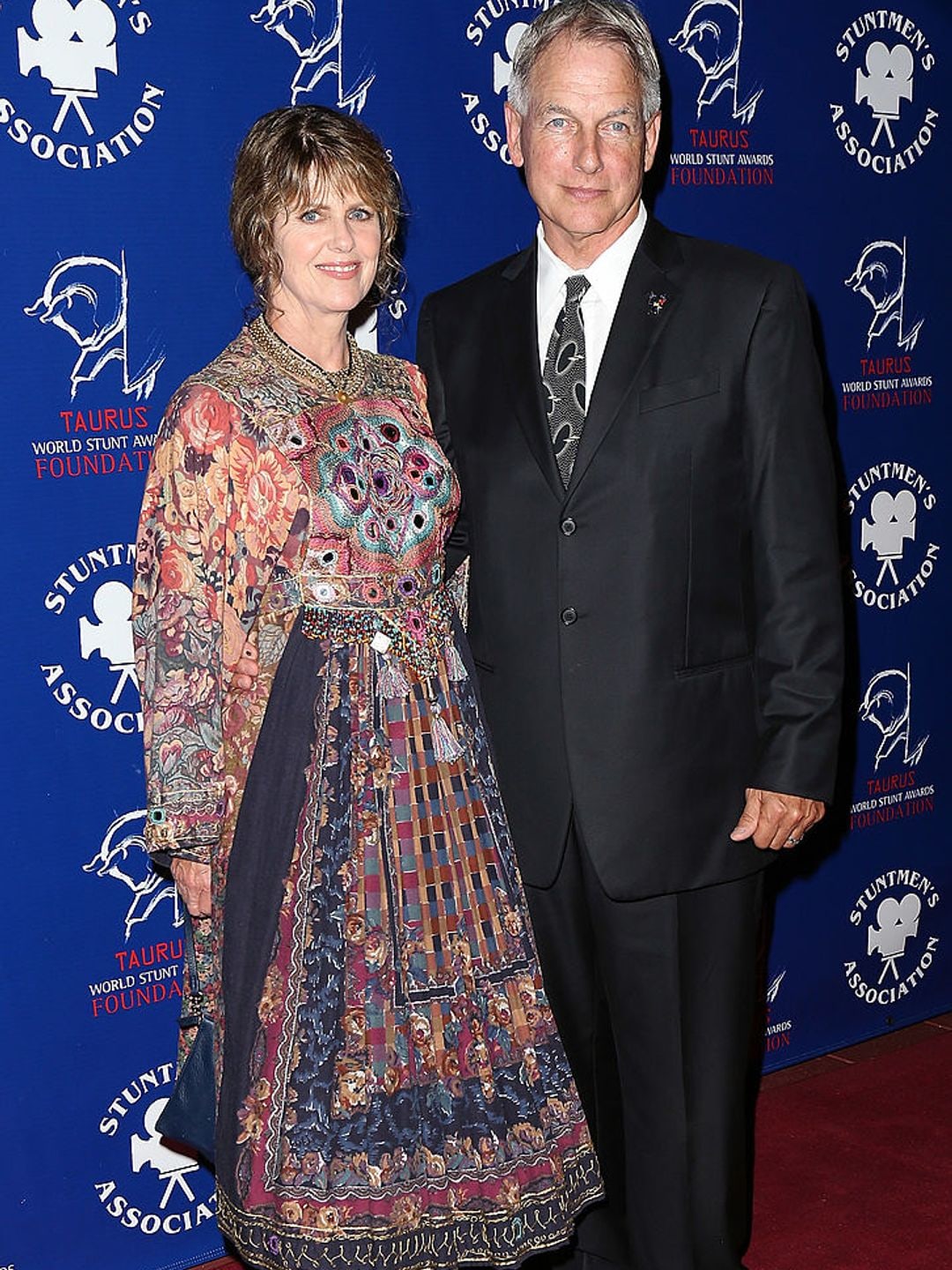 Actress Pam Dawber (L) and husband actor Mark Harmon attend the Stuntmen's Association of Motion Pictures 52nd Annual Awards Dinner in 2013. 