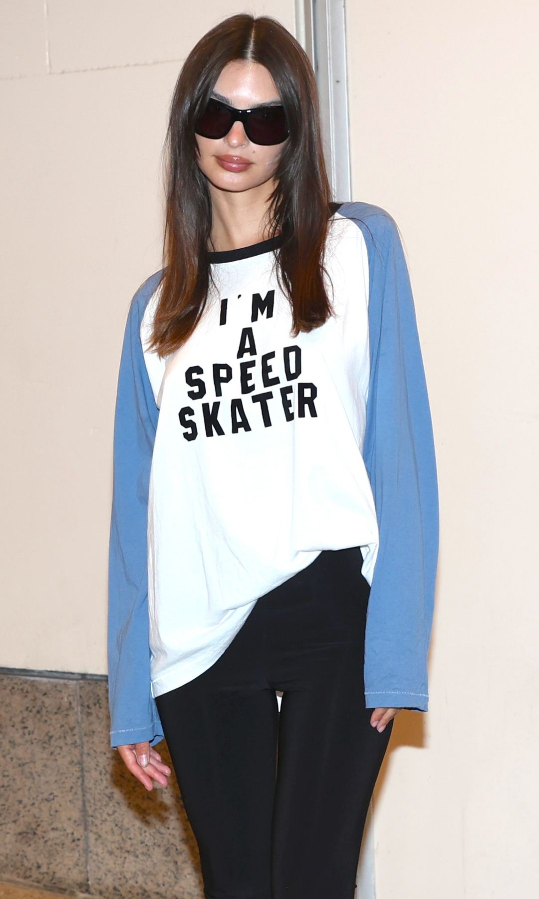 Emily Ratajkowski wore a slogan baseball top in July
