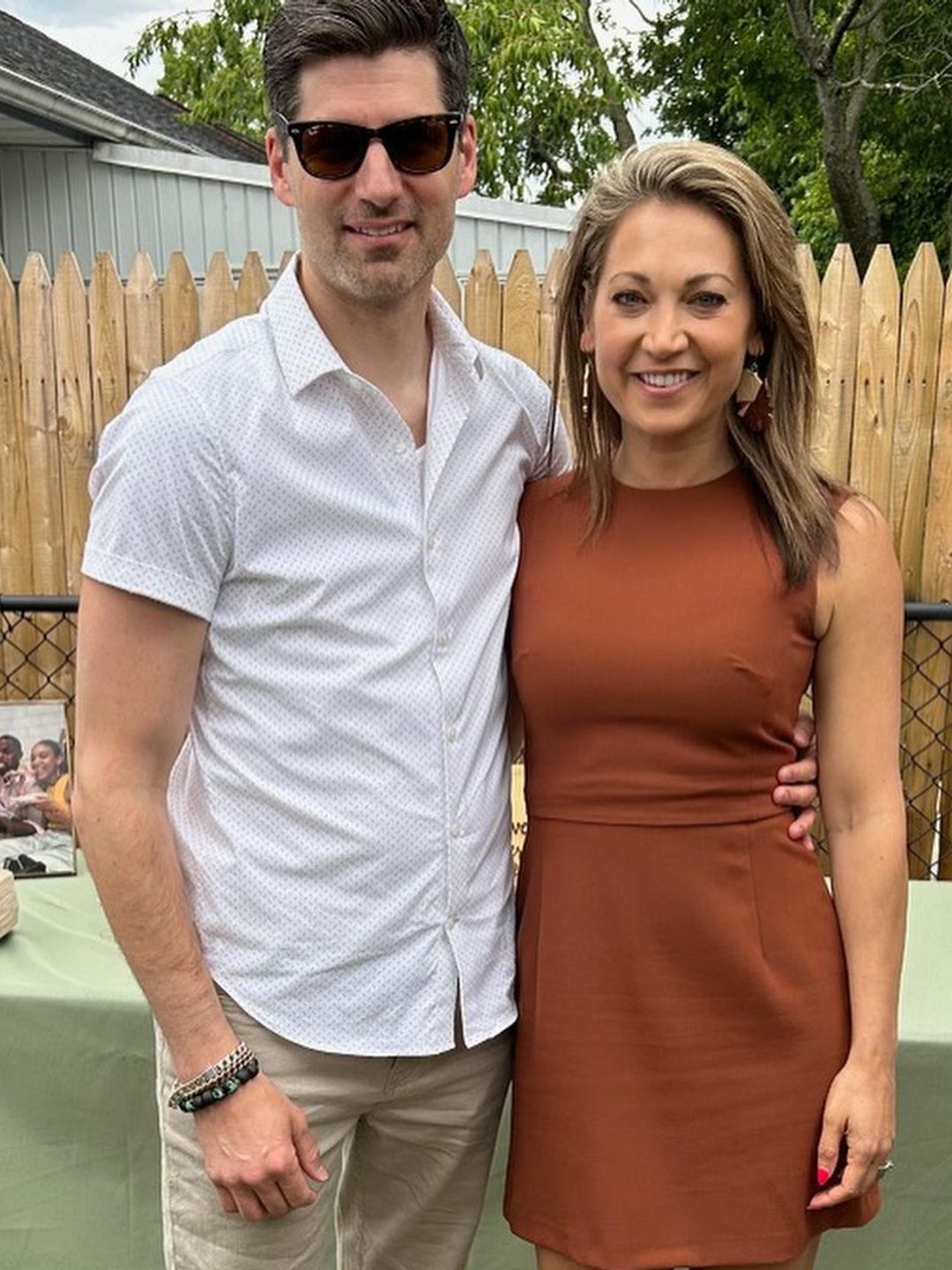 Ben and Ginger Zee smiling for a photo at the wedding