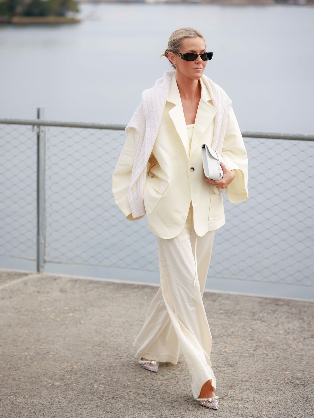 Fredrika Akander wears an oversized cream suit 