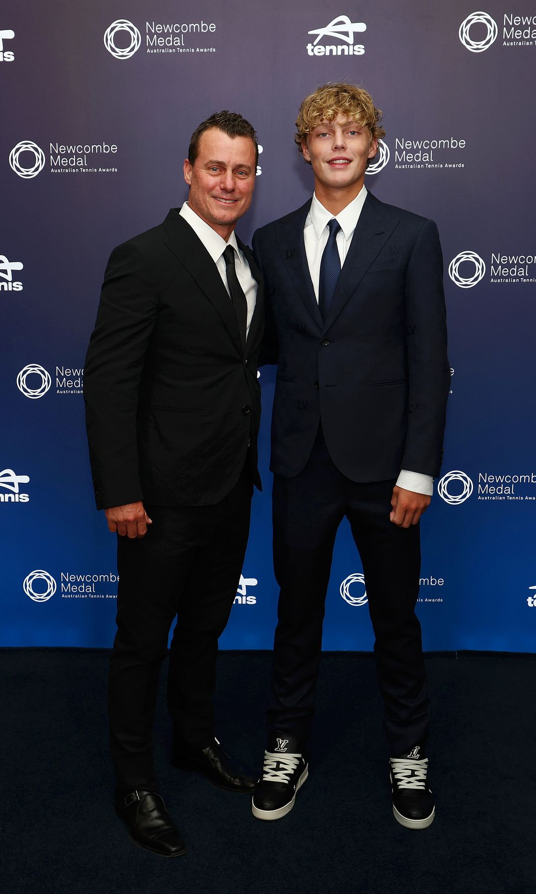 When did Cruz play doubles tennis with his father?