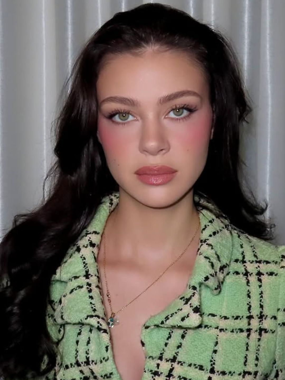 Nicola Peltz-Beckham's signature red blush is very similar to the viral candy cane trend