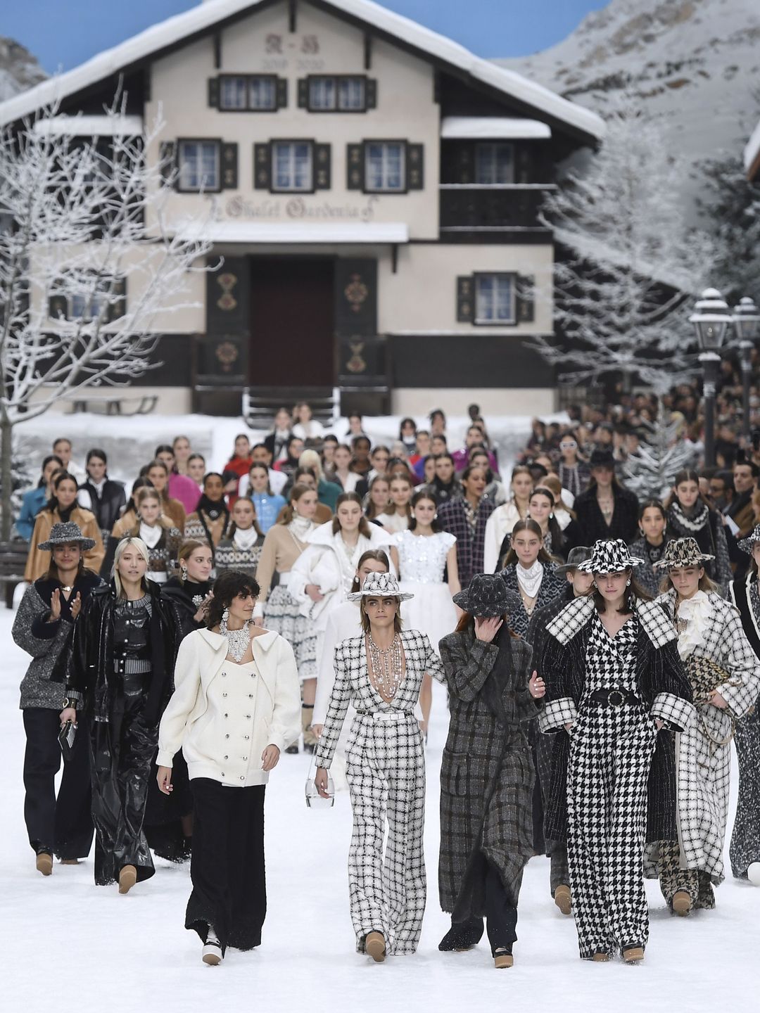 TOPSHOT - (From 2ndL) South Korean model Soo Joo Park, Argentinian model Mica Arganaraz, British model and actress Cara Delevingne, Italian model Mariacarla Boscono and Australian model Cat McNeil, applaud in  on March 5, 2019. (Photo by Christophe ARCHAMBAULT / AFP)        (Photo credit should read CHRISTOPHE ARCHAMBAULT/AFP via Getty Images)