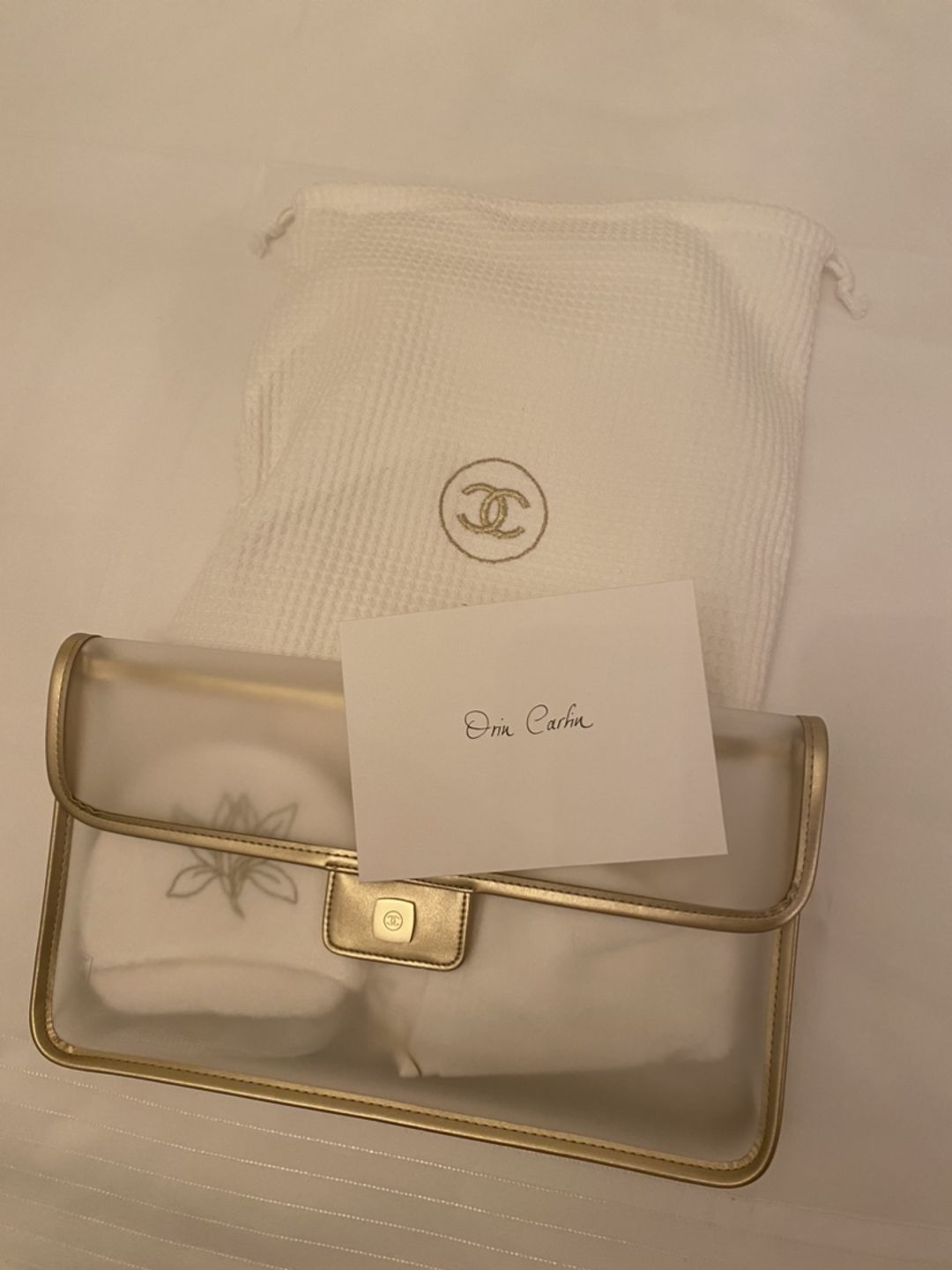 Chanel towel, skincare package and envelope 