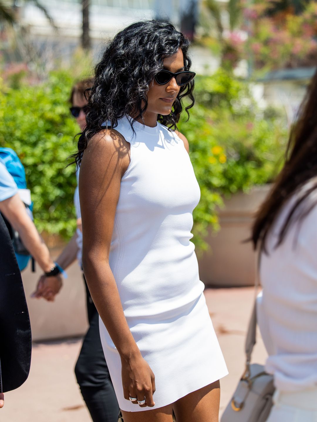 Bridgerton's Simone Ashley opted for a cool white mini dress and sunglasses