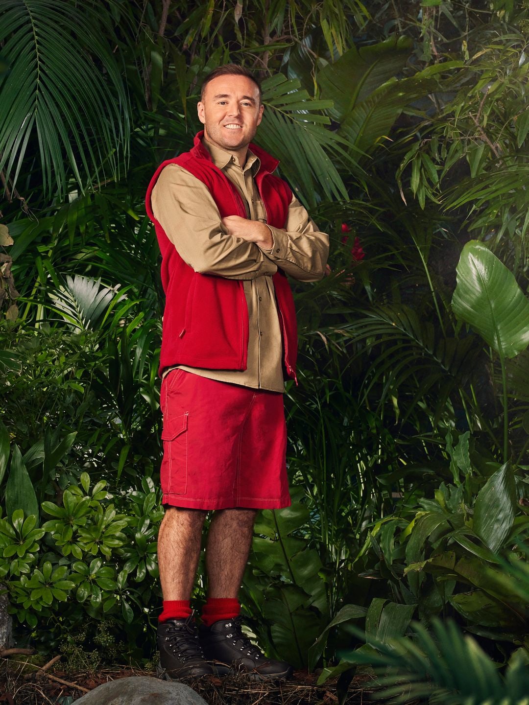 i'm a celeb contestant in red outfit 