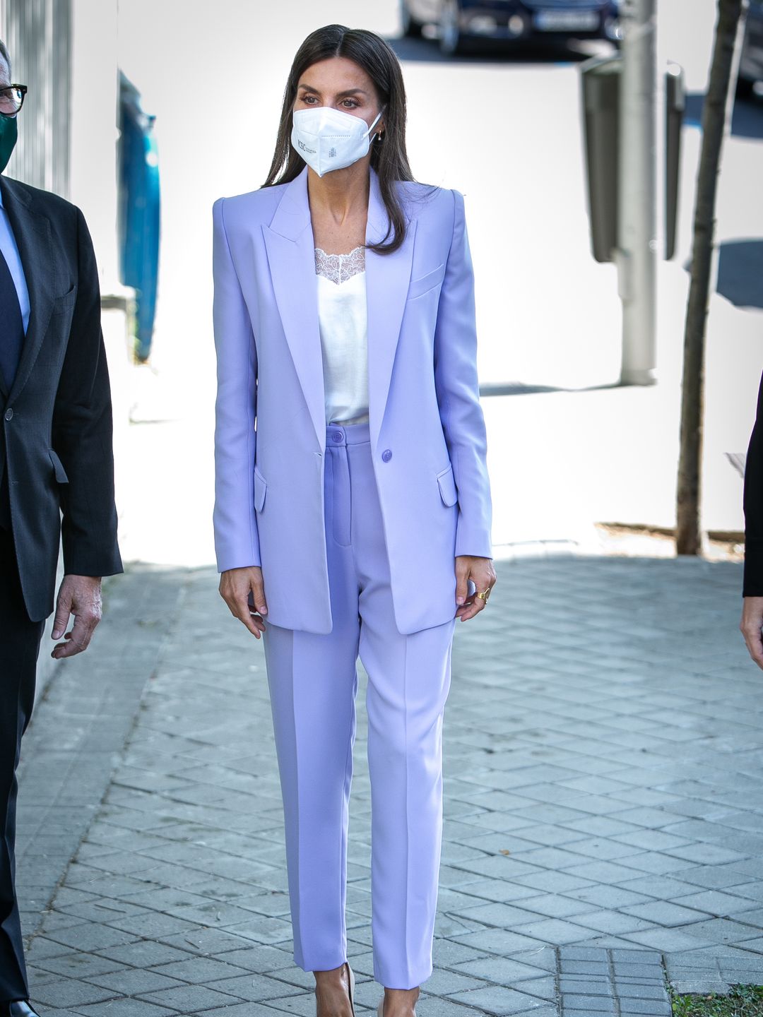  Queen Letizia of Spain attends a meeting at AECC (Spanish Association Against Cancer) on September 22, 2021 in Madrid, Spain wearing a lilac suit