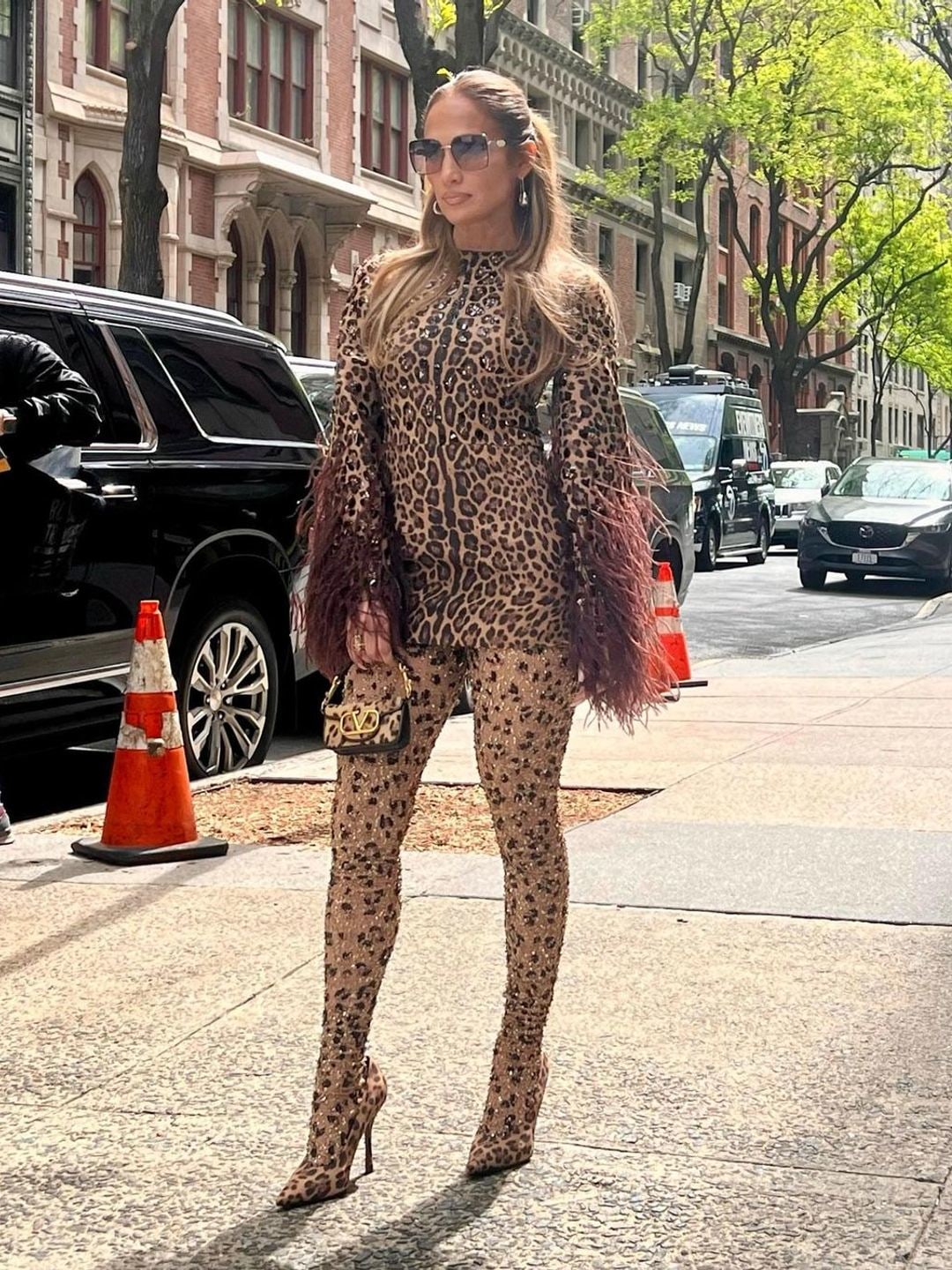 Jennifer Lopez wears a full animal print outfit on the streets of NYC