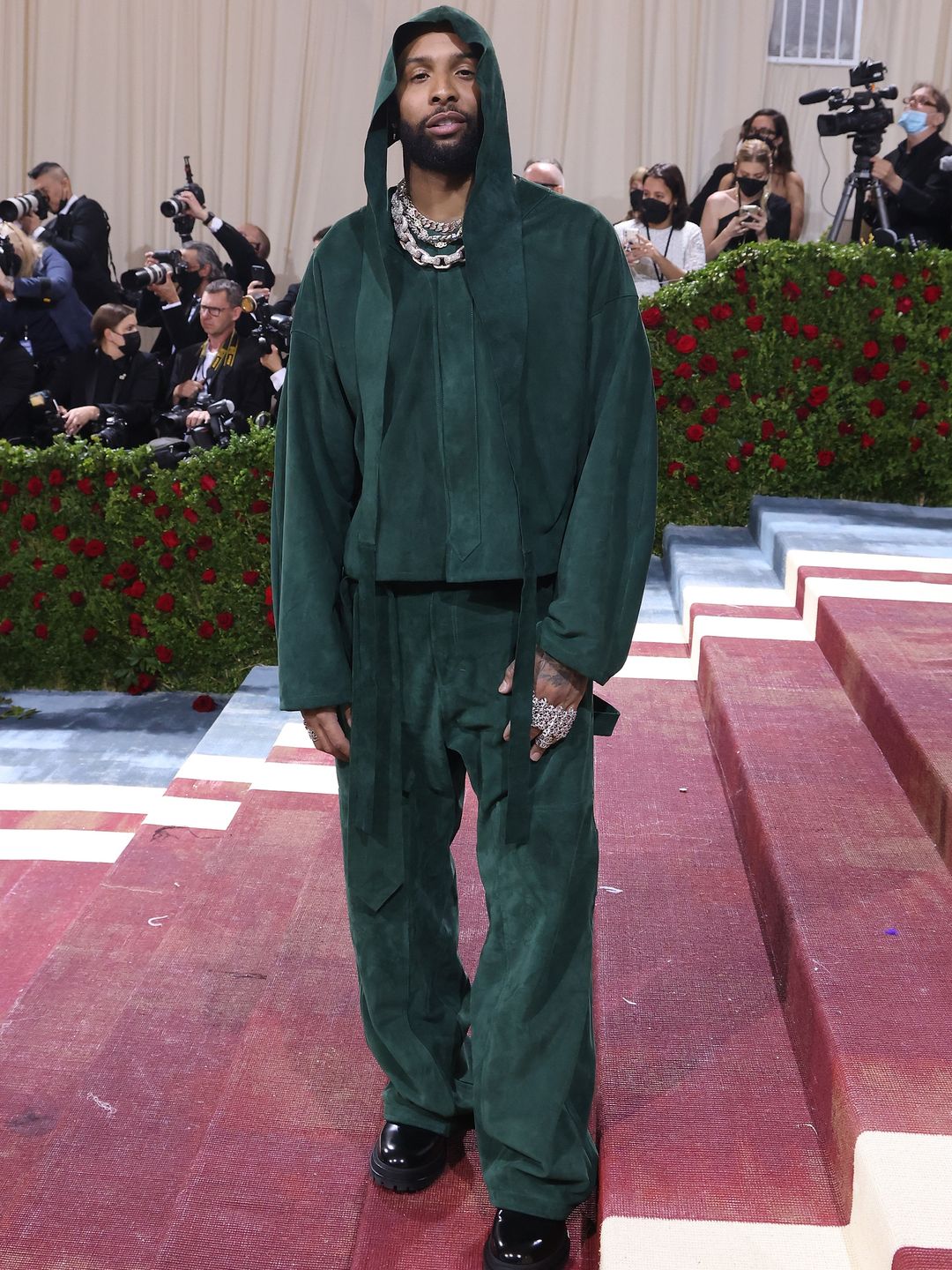 Odell Beckham Jr. attends "In America: An Anthology of Fashion," the 2022 Costume Institute Benefit at The Metropolitan Museum of Art in a green jacket and toruser combo