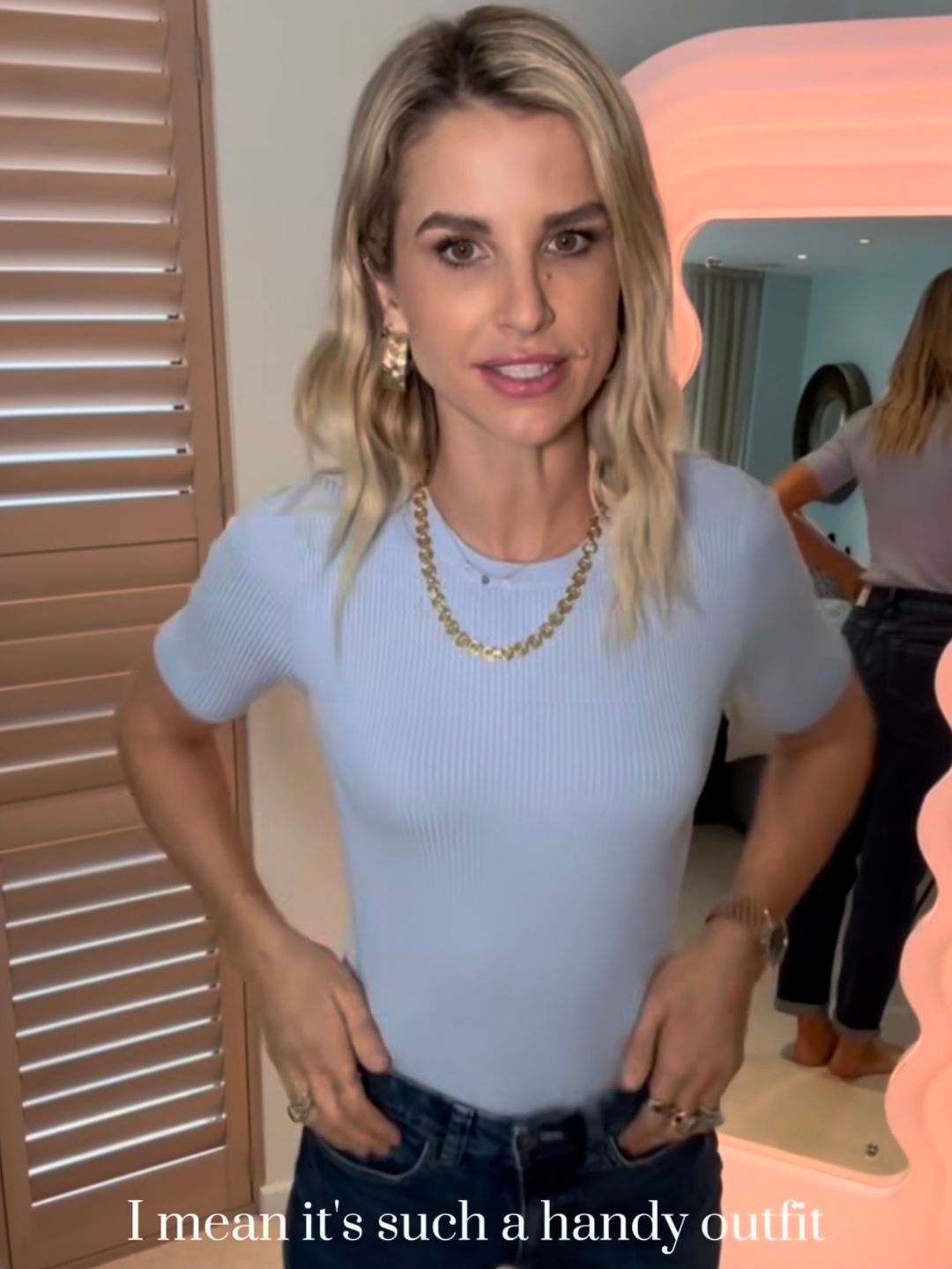 vogue williams in jeans and blue top