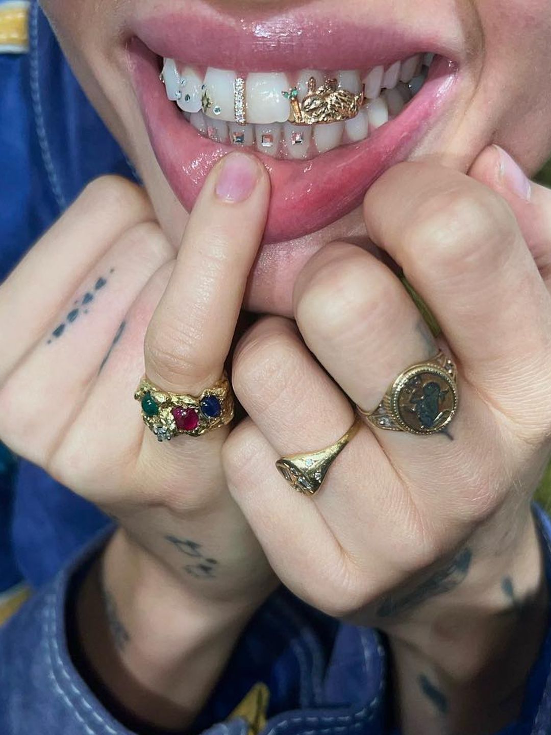 Insatgram mogul @linmick shows off her tooth gems 