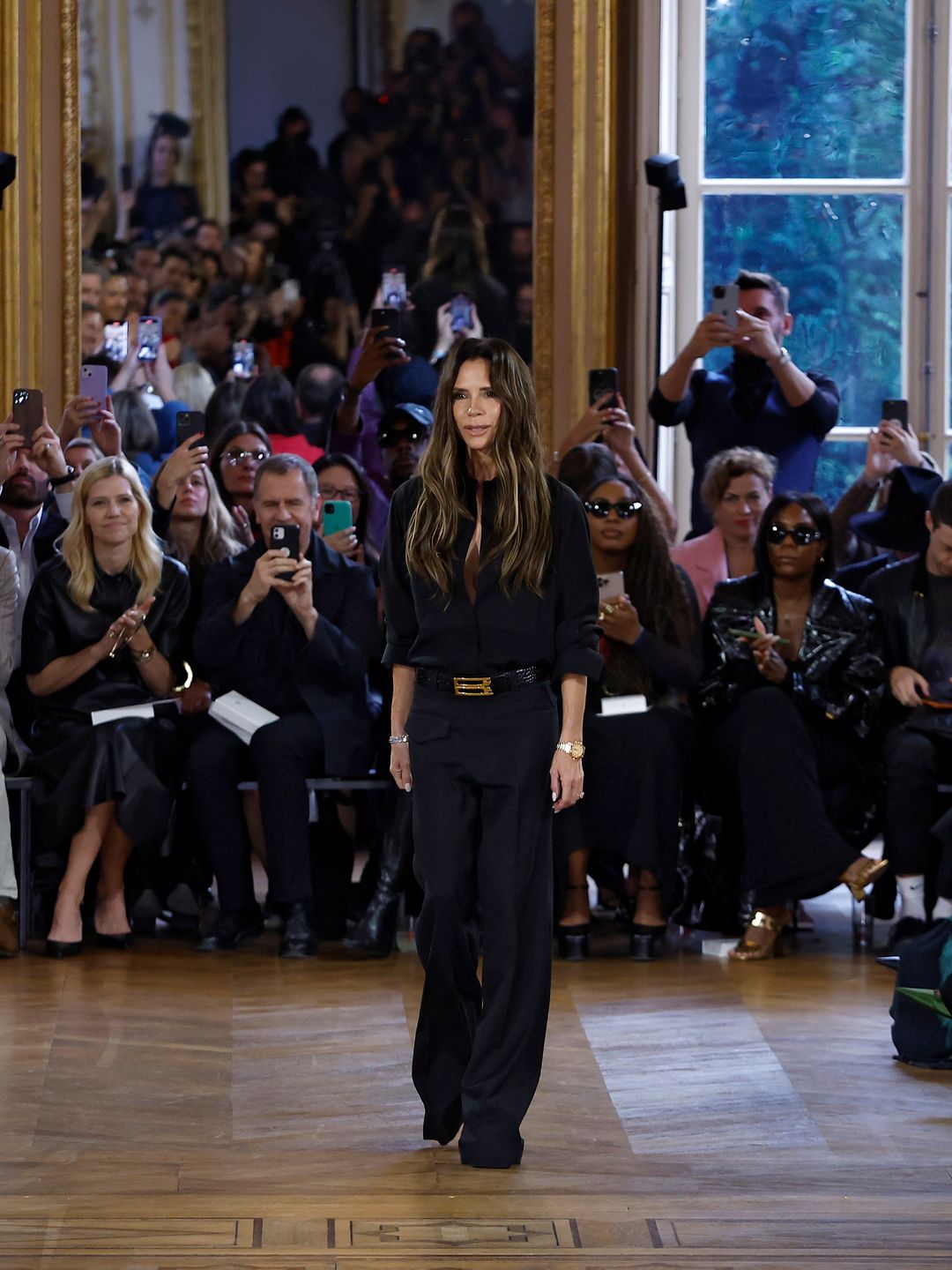 PARIS, FRANCE - SEPTEMBER 29: (EDITORIAL USE ONLY - For Non-Editorial use please seek approval from Fashion House) Fashion designer Victoria Beckham at the runway during the Victoria Beckham Womenswear Spring/Summer 2024 show as part of Paris Fashion Week on September 29, 2023 in Paris, France. (Photo by Estrop/Getty Images)