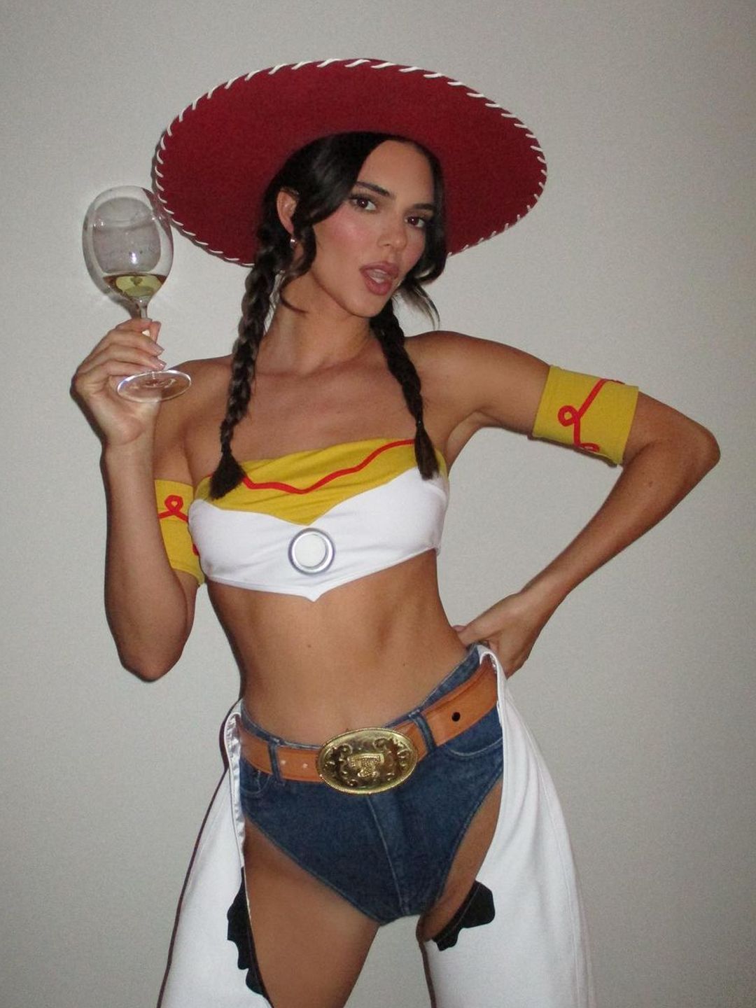 Kendall Jenner wearing a cowboy outfit