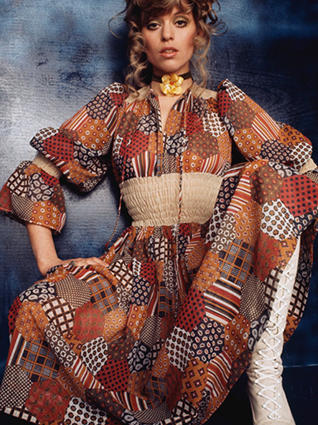 Woman wearing a patchwork peasant dress