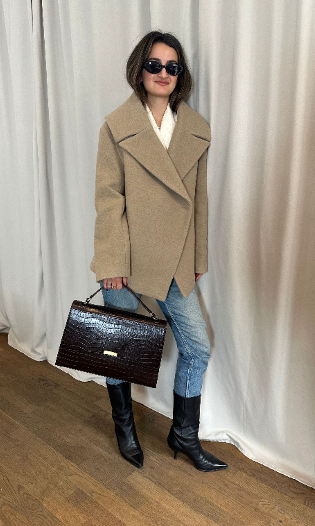 Perdsheng De Geer in beige coat