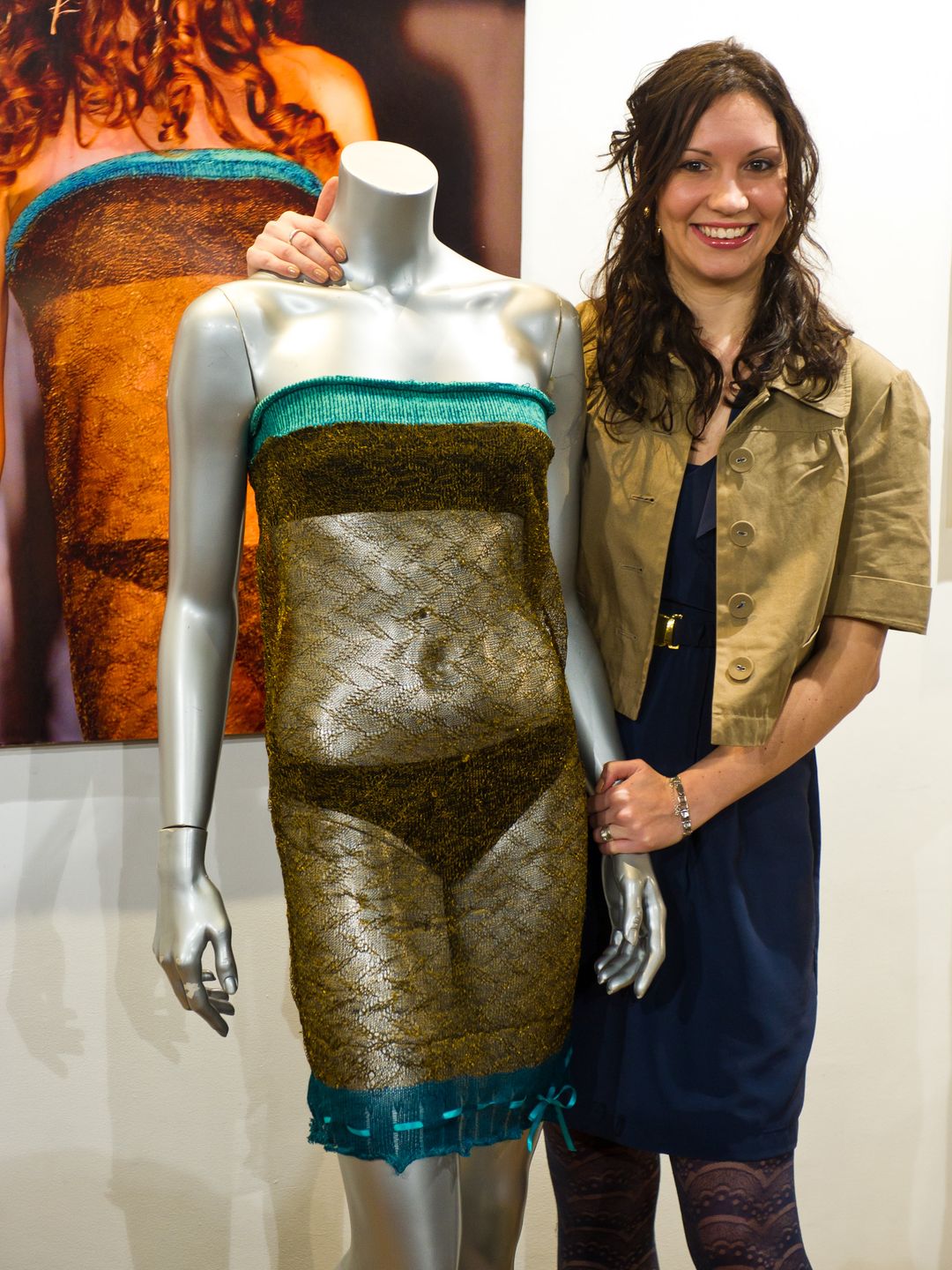 Charlotte Todd standing next to her piece of fashion history