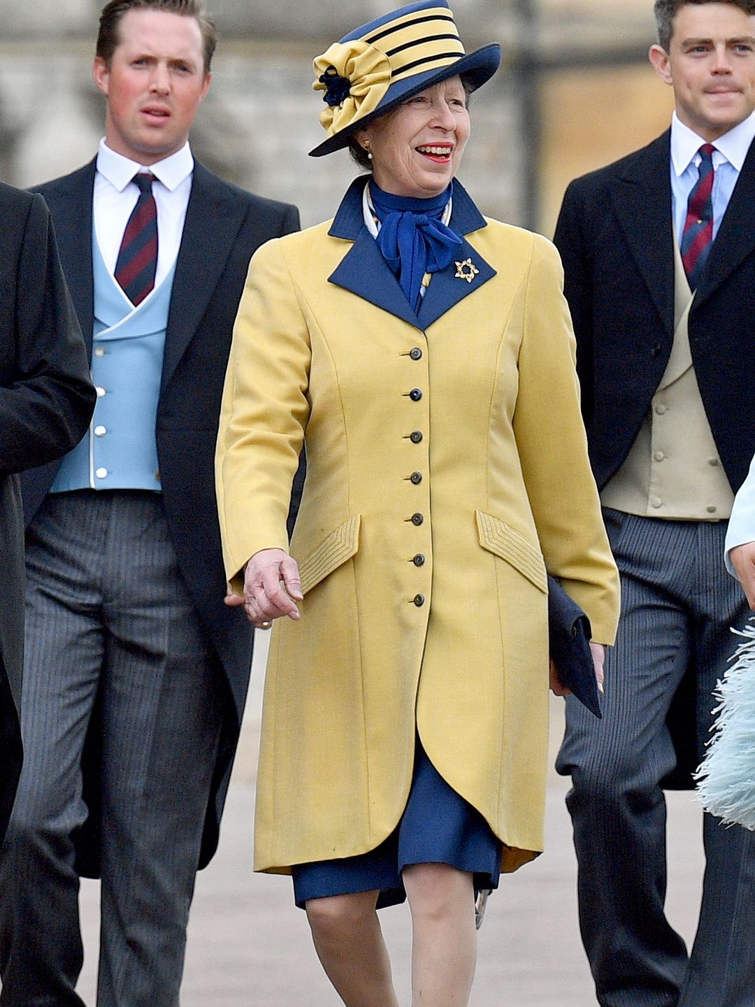 Princess Anne in a yellow and blue outfit at Lady Gabriella Windsor's wedding