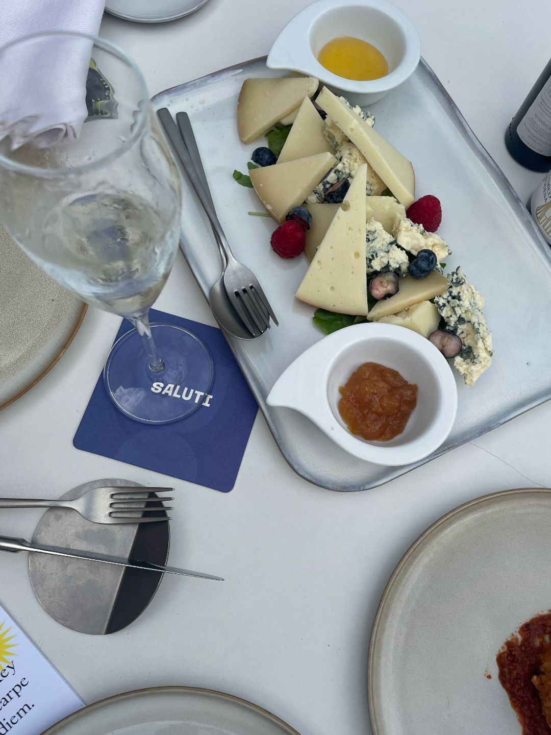 A close up image of a cheese board in Rome