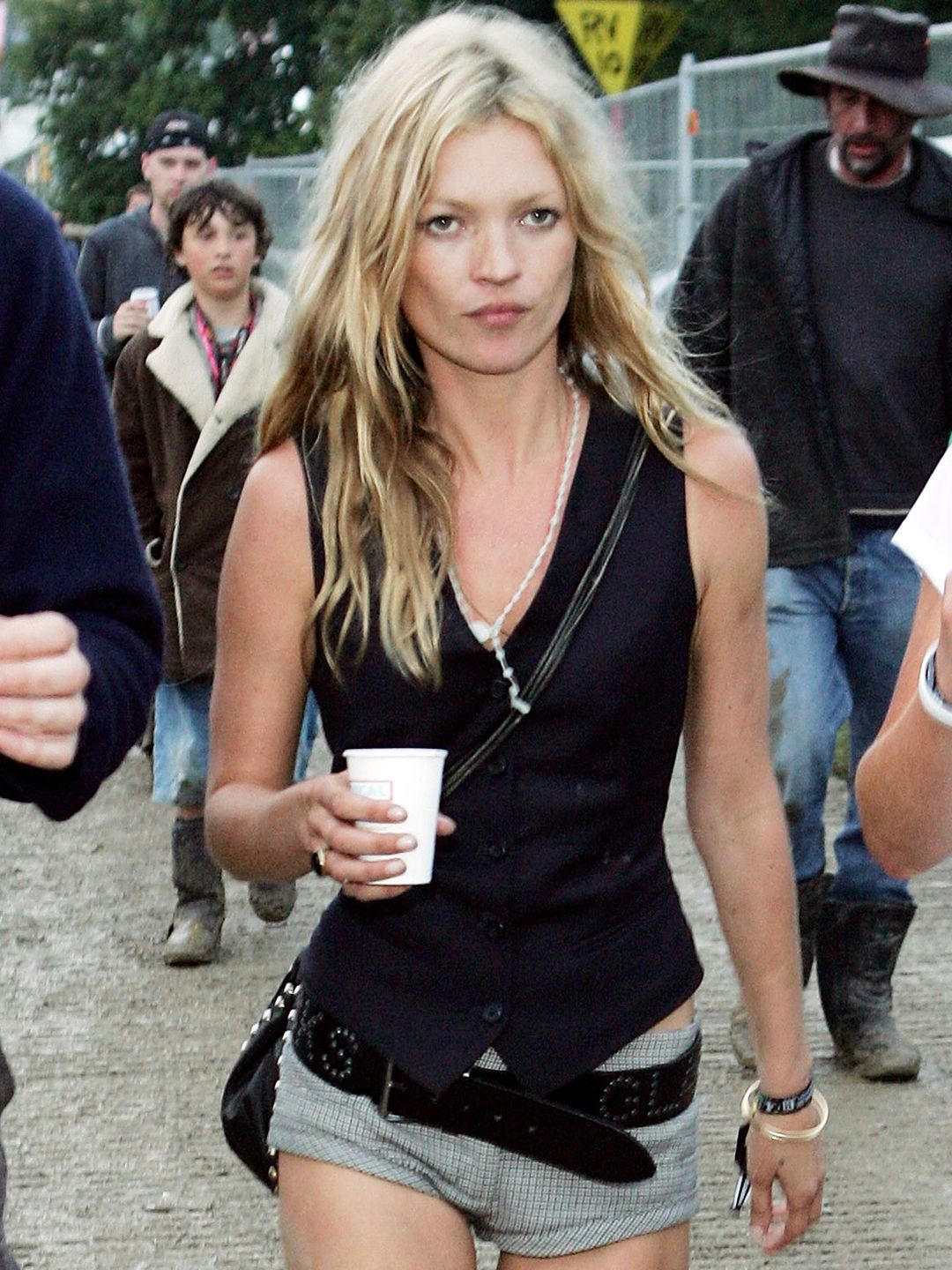 Kate Moss wearing wellies and shorts at Glastonbury