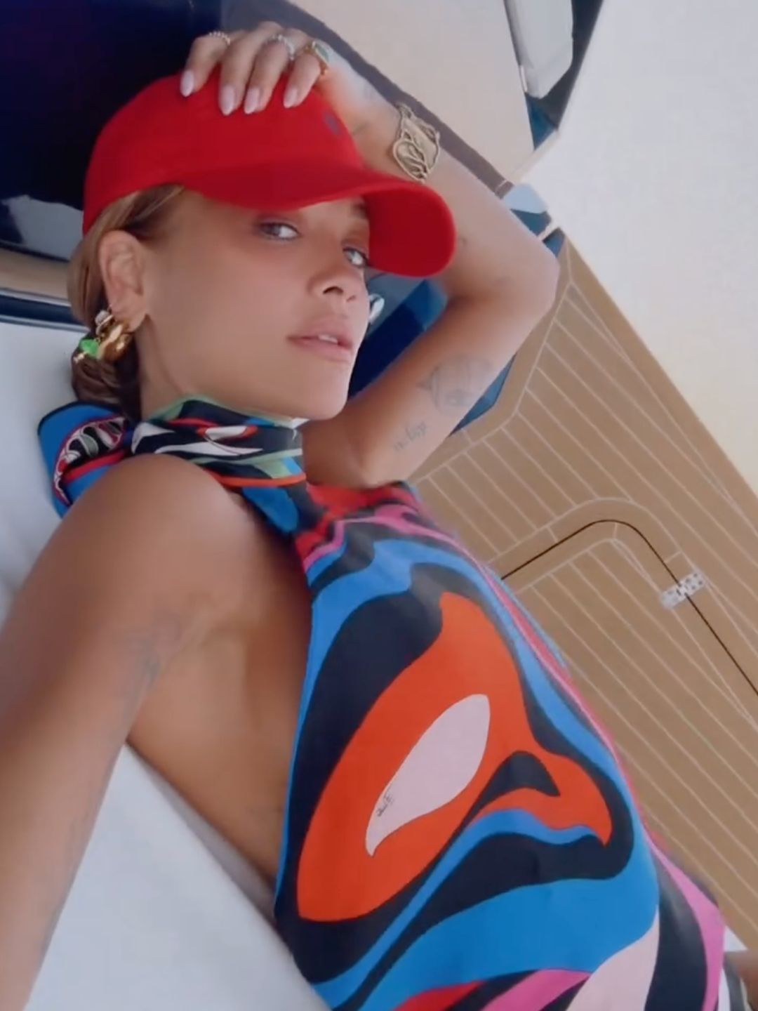 Rita Ora poses on a boat while on holiday