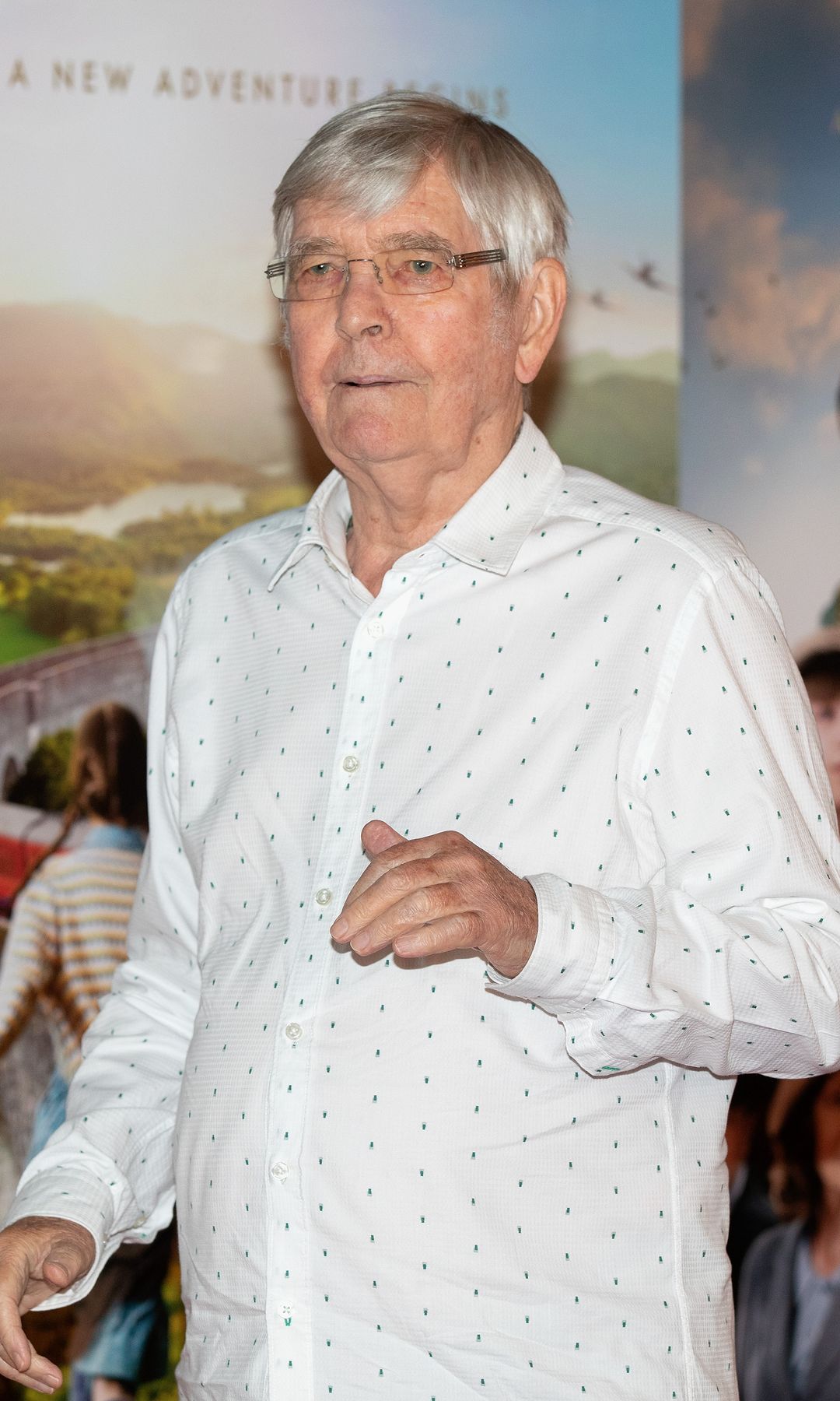 Tom Courtenay in a white shirt