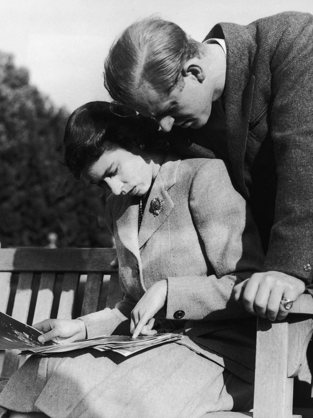 Prince Philip and the Queen going through their wedding album