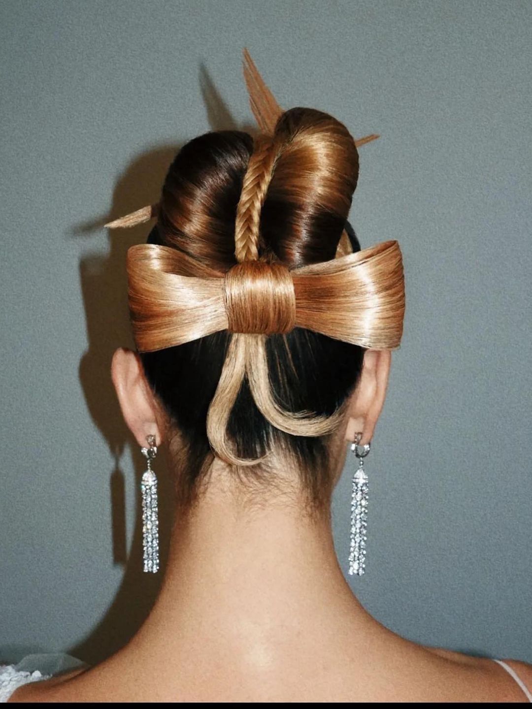 Lily James shares a picture of the back of her hair in a bow updo