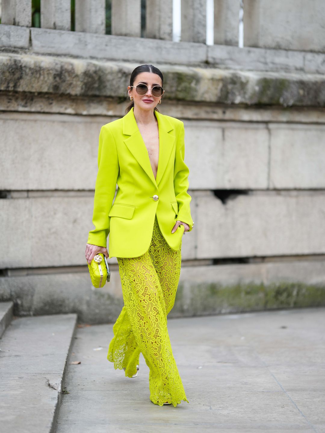 Alexandra Pereira wears an acid yellow blazer 