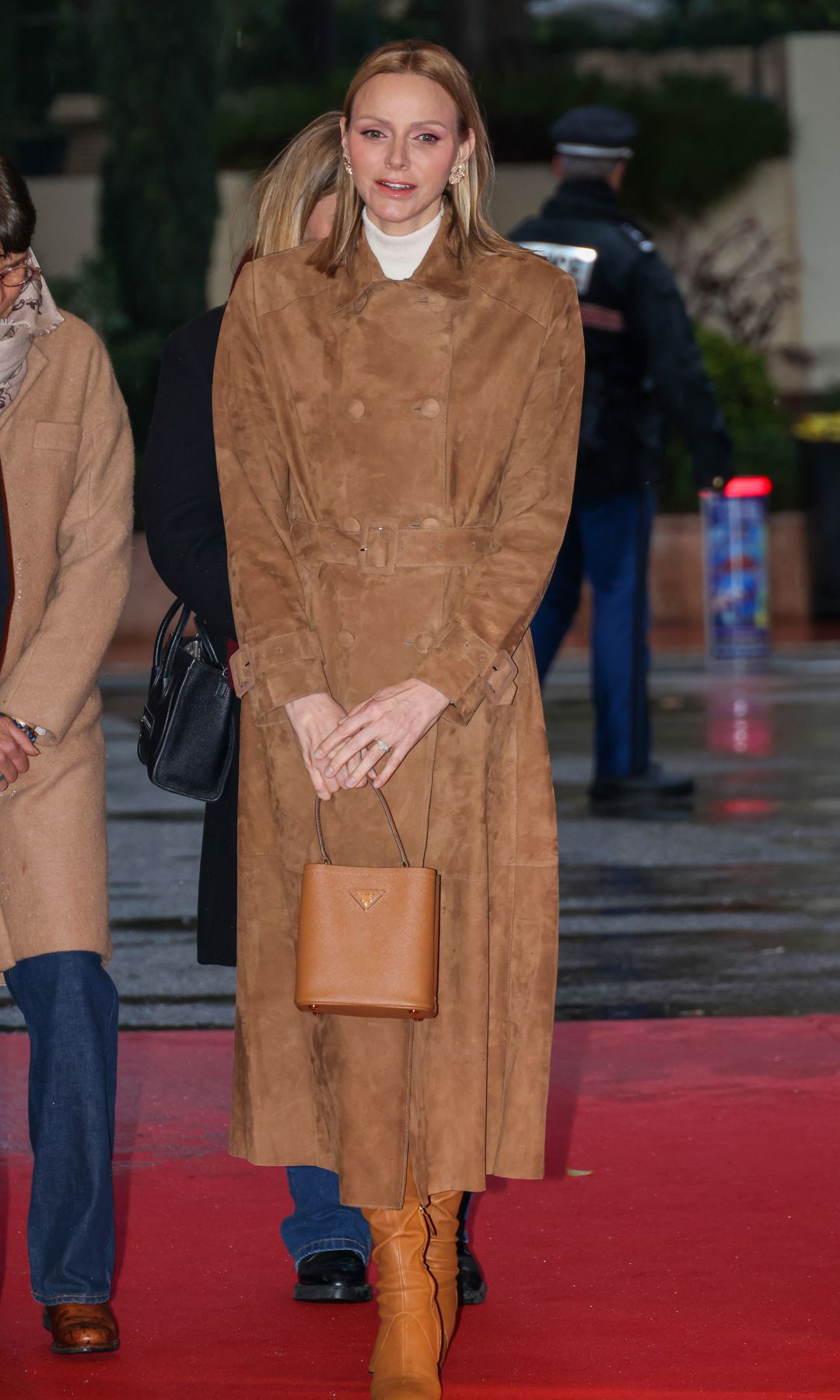 Princess Charlene in a brown coat