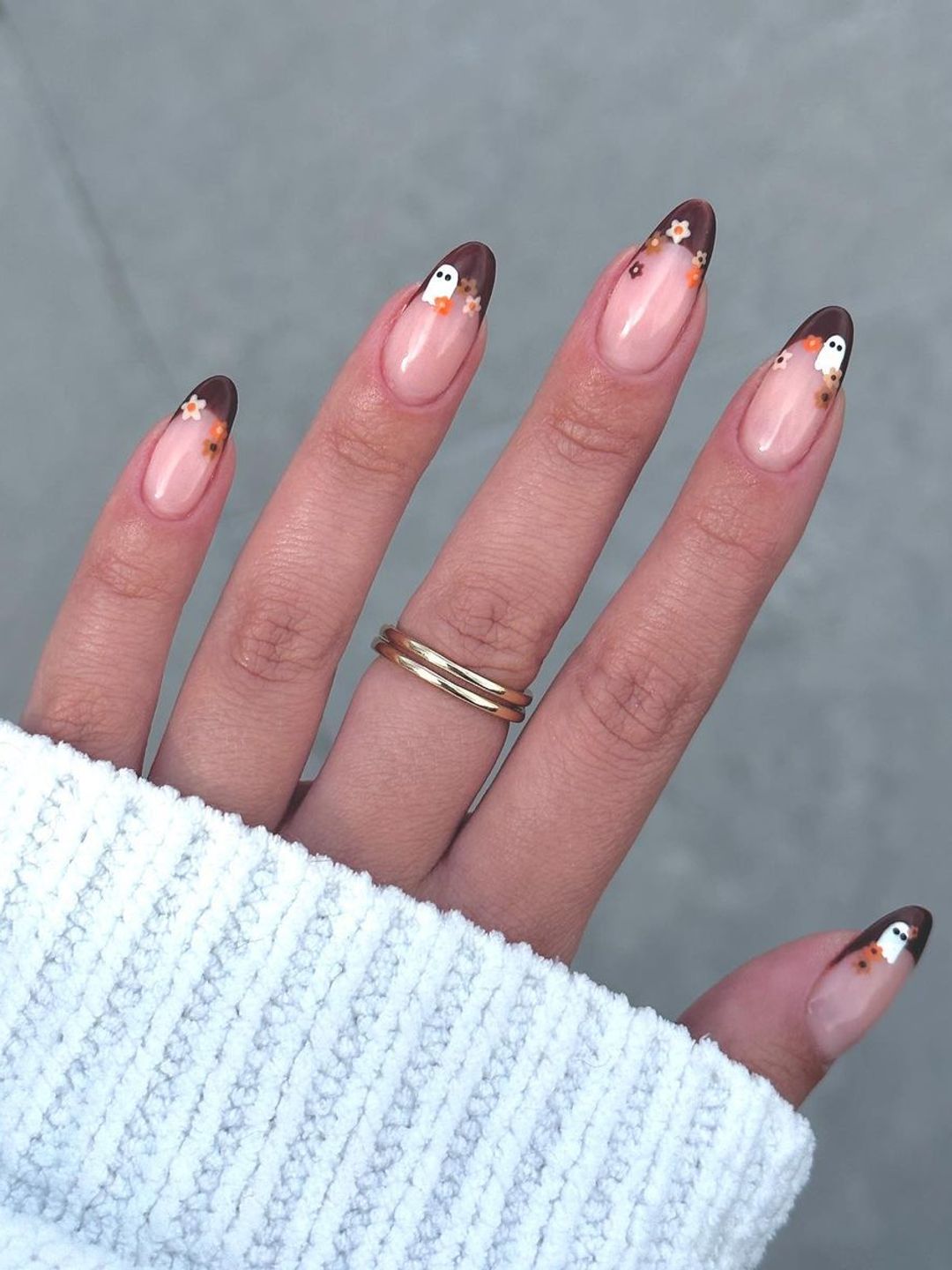 Nails with brown tips and ghost nail art 