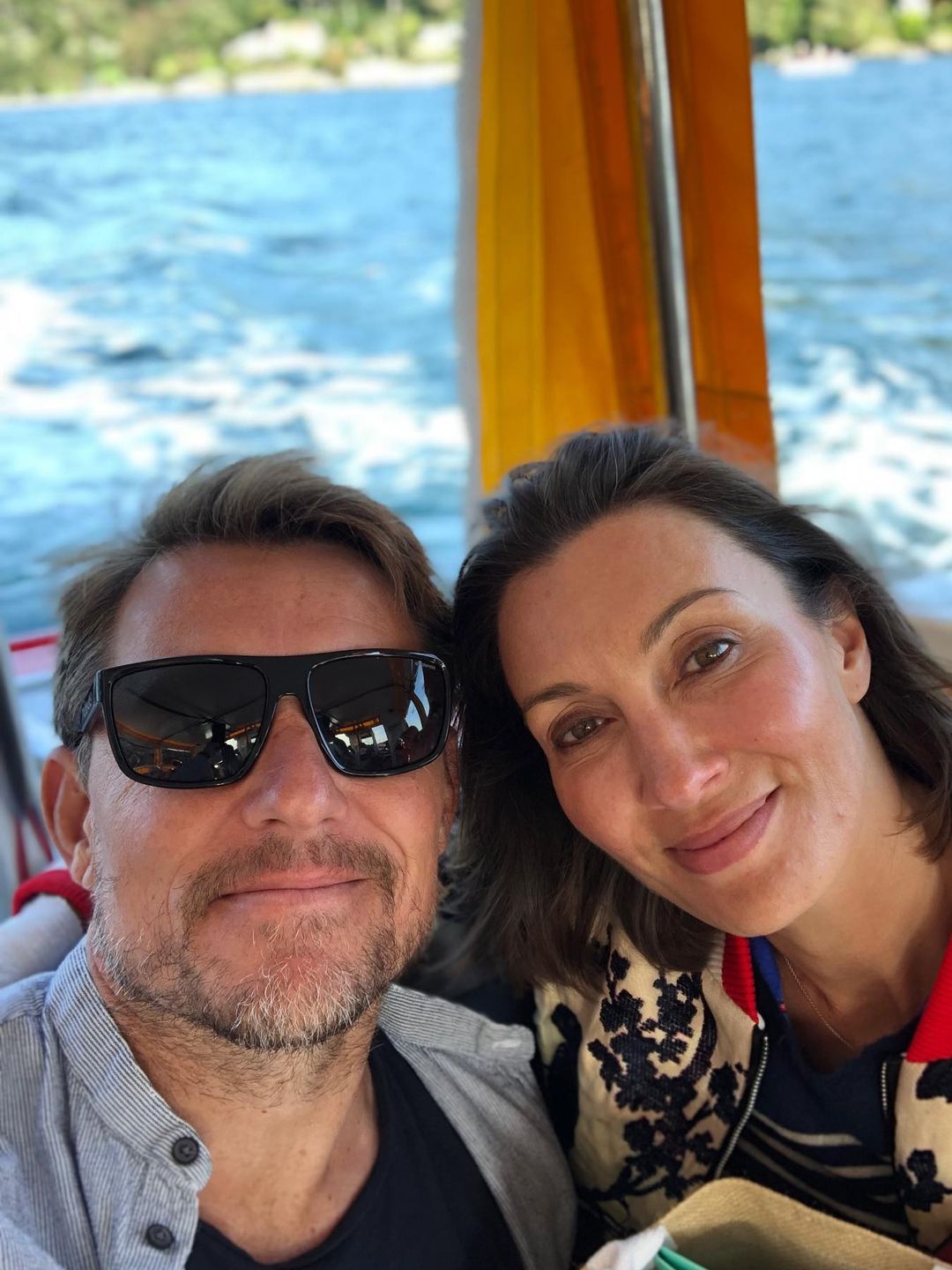 couple posing on boat 