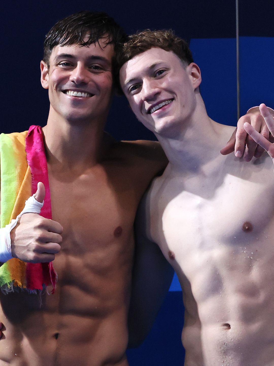 Tom Daley and Noah Williams shirtless following a silver medal