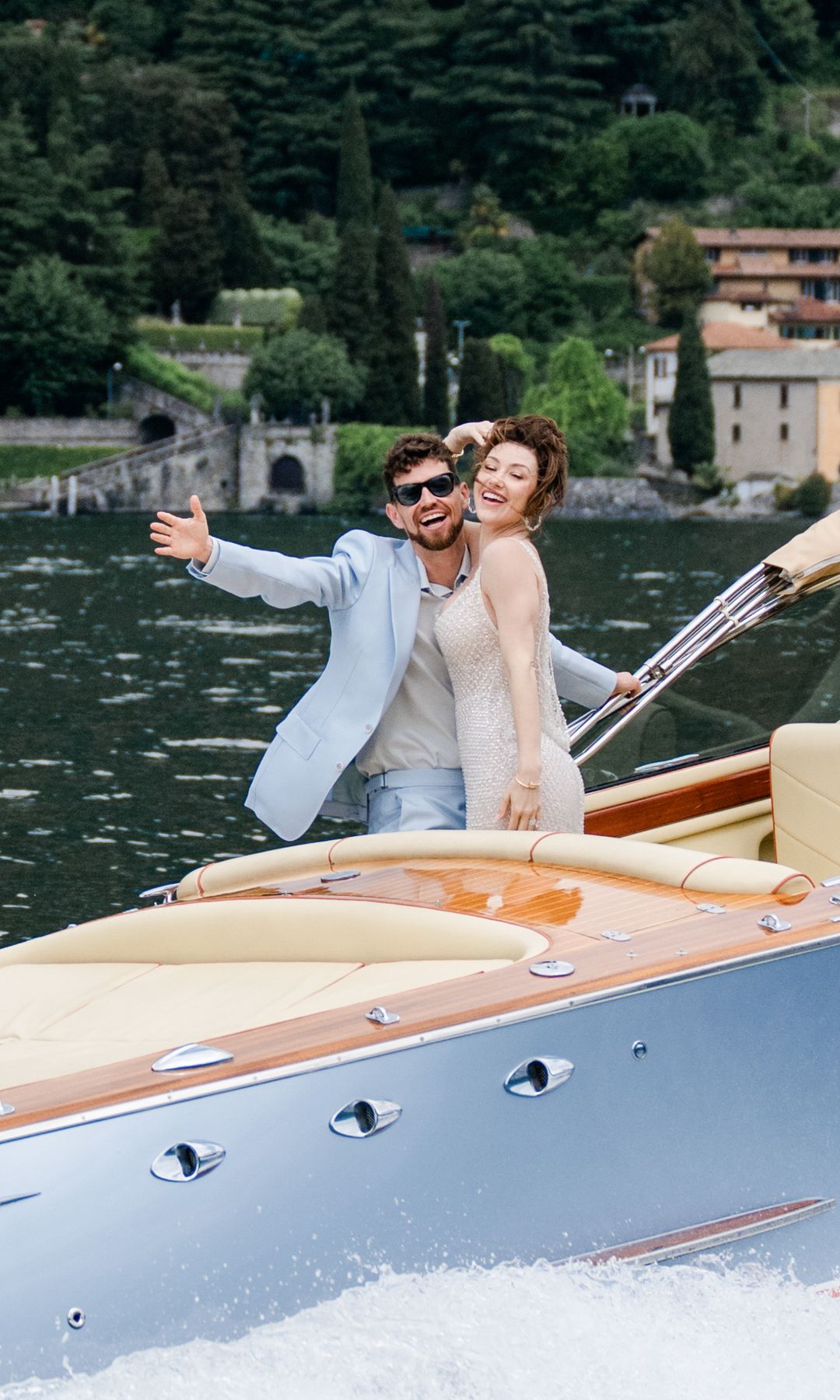 The newlyweds arrived by boat to their beach party