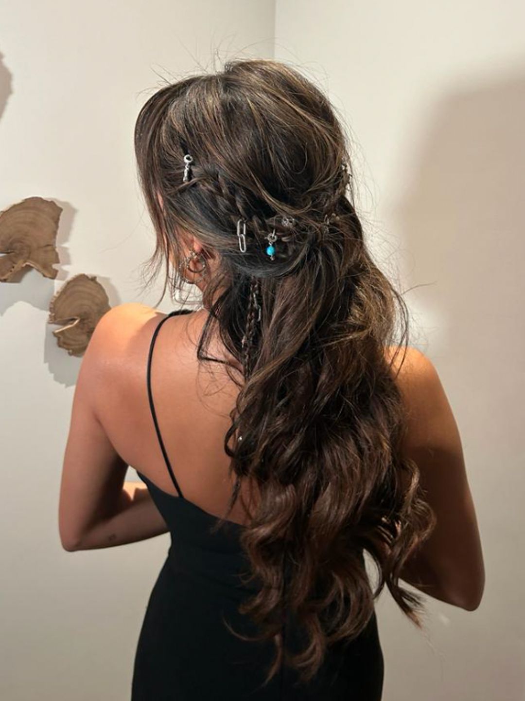 Ashley Park's hair, adorned with Pandora charms 