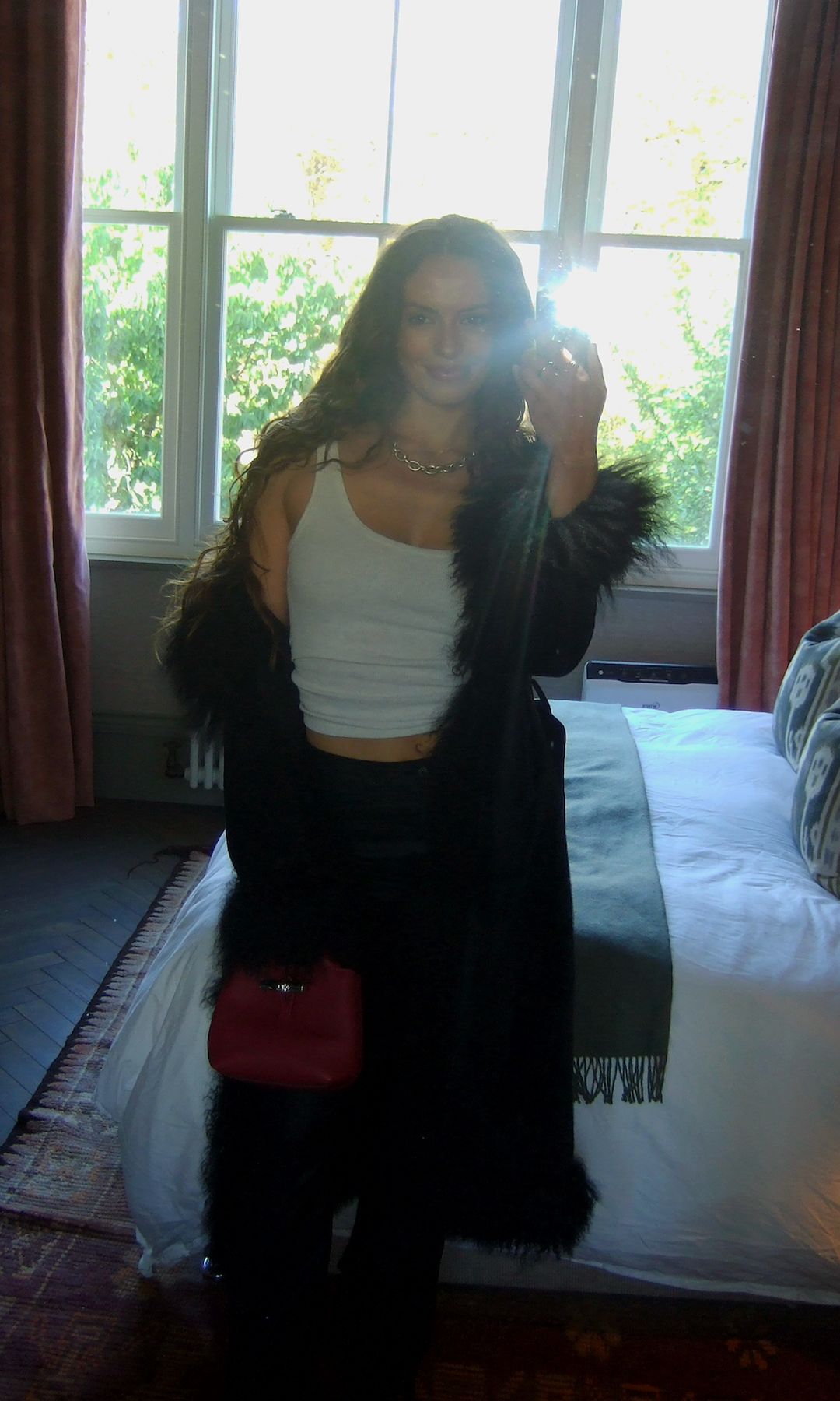 taura lamb selfie in fluffy coat