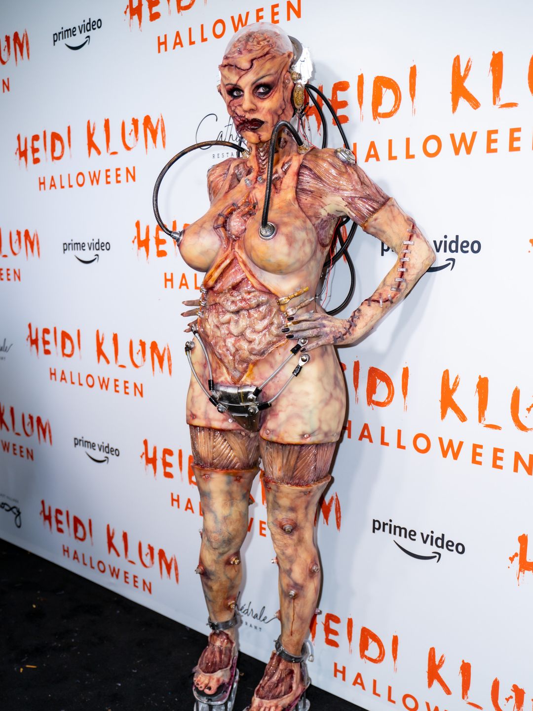 Heidi Klum attends Heidi Klum's 20th Annual Halloween Party dressed as an alien experiment gone wrong 